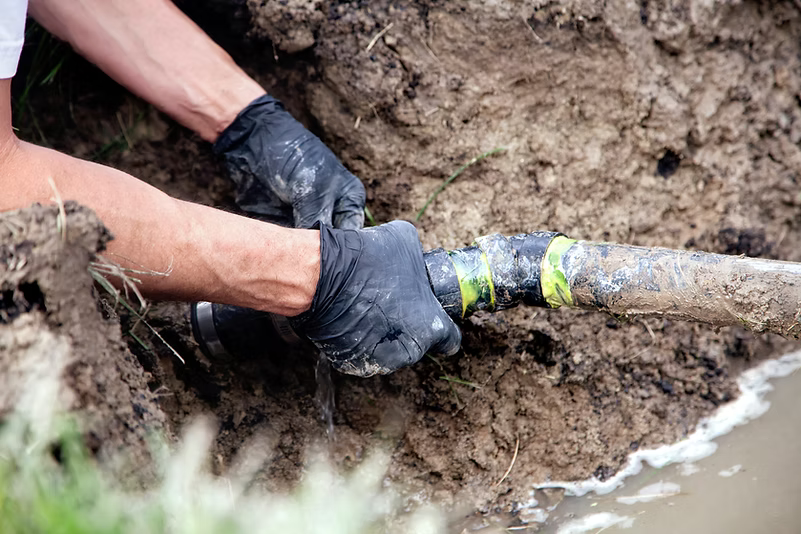 Man Holding Pipe
